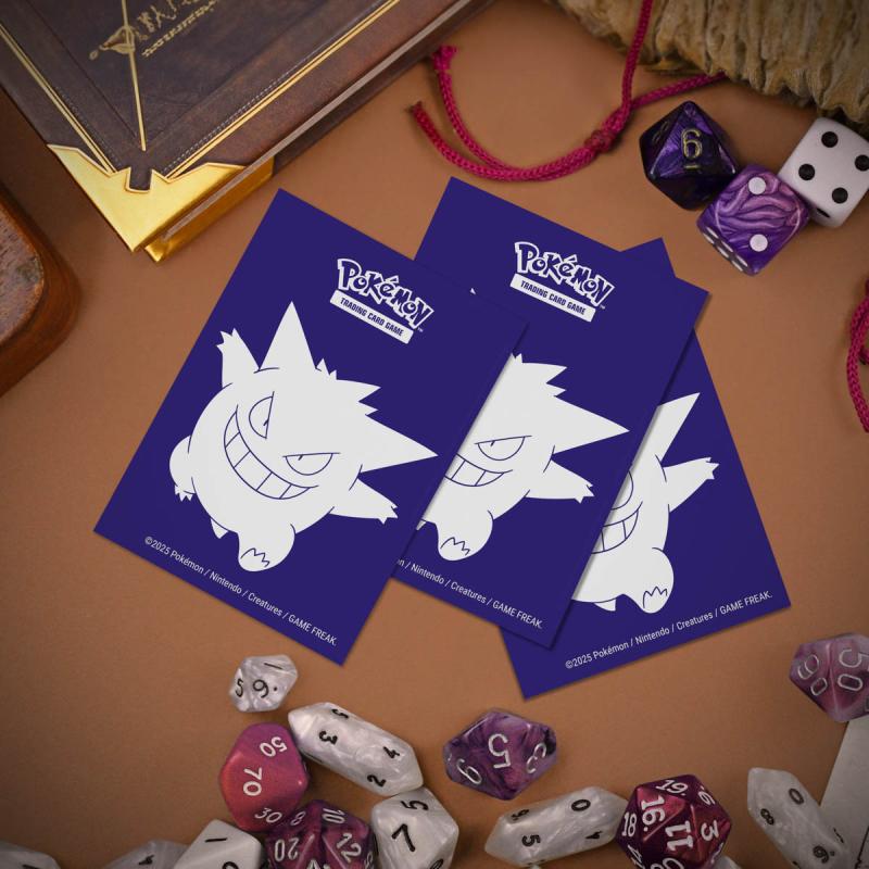 An image shows 3 card sleeves laid out on a table. Each sleeve is purple with a white illustration of a gengar on it.