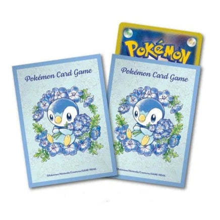 The image shows Piplup holding blue flowers while surrounded by a crown of blue flowers. What a cutie.